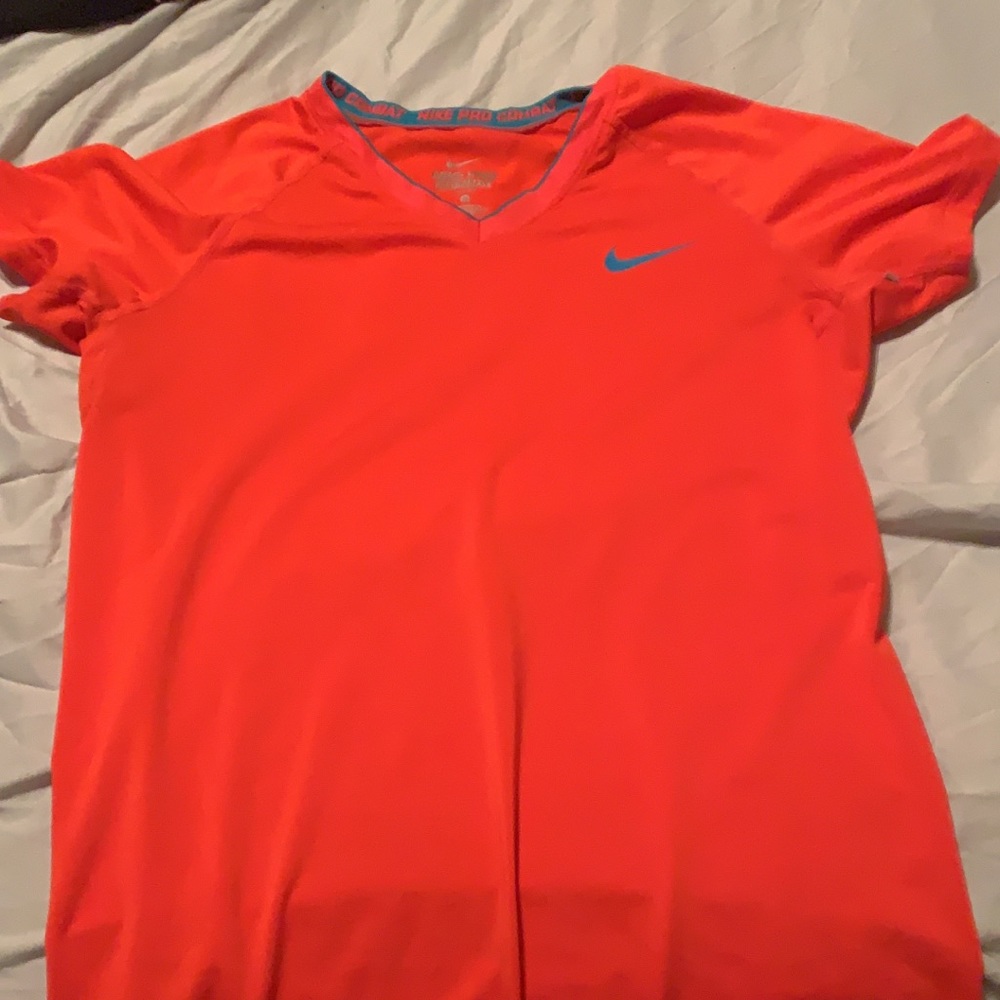 Orange Nike shirt
